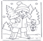 Bambino e albero di Natale